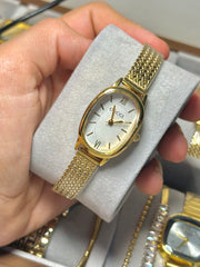 Gucci gold in white