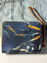 Wallet in brown jeans