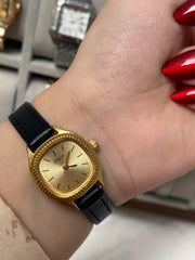 Golden charm black leather watch