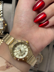 Omega Round gold watch