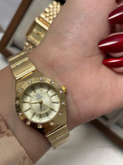 Omega Round gold watch