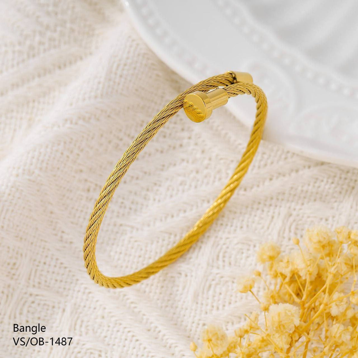 Gold nail bracelet