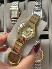 Omega Round gold watch