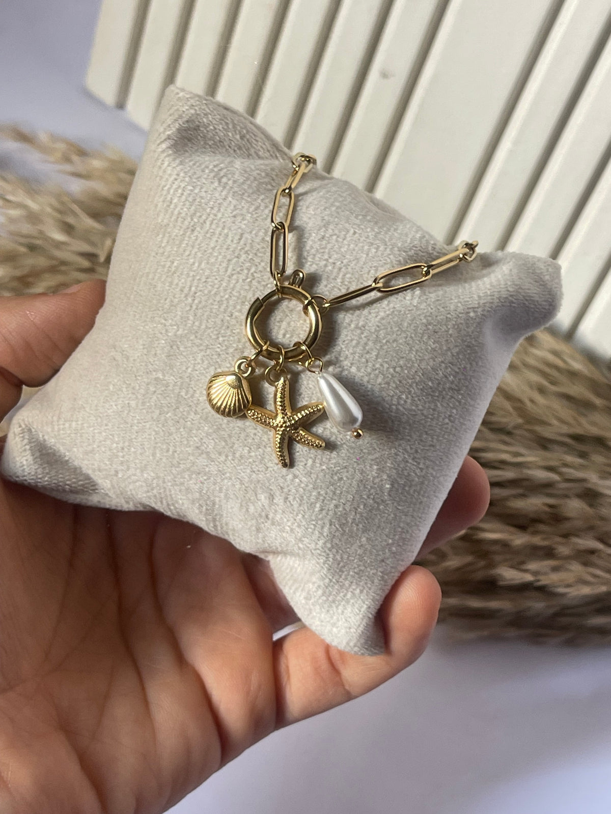 Elegant Charm and Pearl Necklace