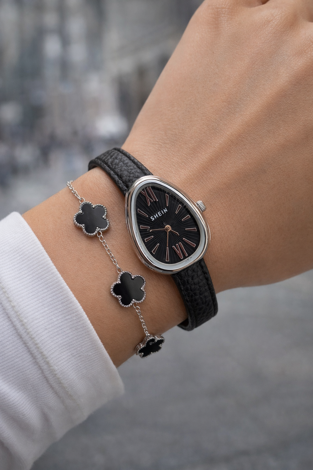 Leather and van clef silver