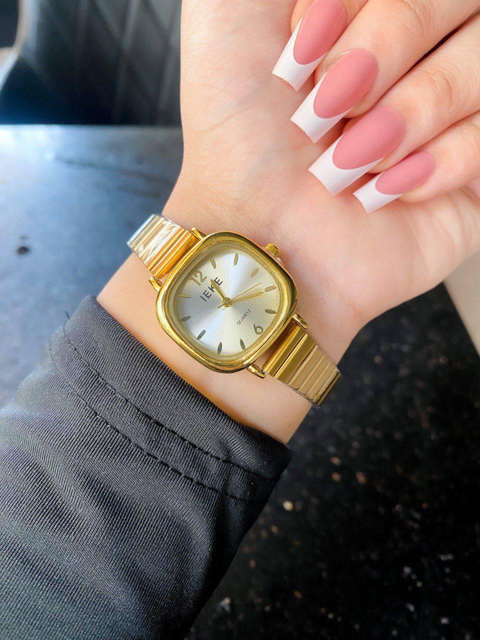 ieki in gold with white