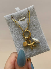 Elegant Charm and Pearl Necklace
