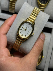 Ieke gold in white oval