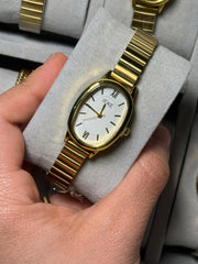 Ieke gold in white oval